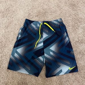 Men’s blue lined Nike swim trunks
